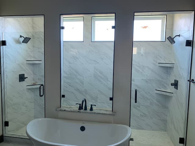 Floor-to-ceiling frameless glass room divider